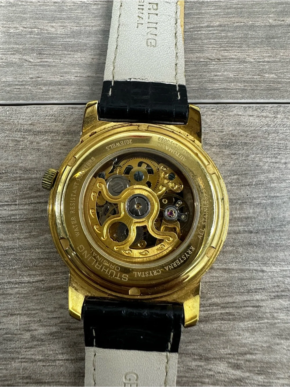 Stührling Automatic Men's Dress Watch Gold Skeleton Dial Black Band